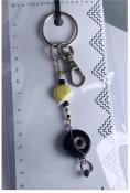 This is a “Limited Edition” beaded Keychain, designed and created by MaterialMomma!