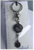 This is a “Limited Edition” beaded Keychain, designed and created by MaterialMomma!
