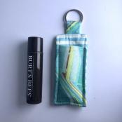 Lip Balm or USB holder.  Easily attach to your purse, backpack, zipper, keychain, etc.  Lip balm not included.