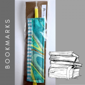 Beautifully sewn and quilted bookmarks for all of the book lovers in your life!  The soft, stretchy string makes it possible to be used in a variety of book sizes. These can also be used horizontally to hold together small collections of notebooks, bigger stacks of paper, cards, etc. 